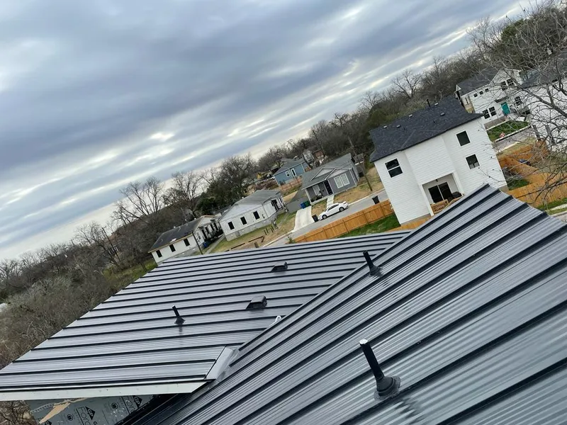 Standing seam metal roof panels with vents for Skylight Repair in New Gloucester